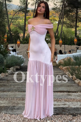 Blush Pink Off-the-Shoulder Prom Dress with Gold Floral Brooch and Pleated Skirt